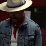 Clayton Wyatt wearing a hat and denim jacket
